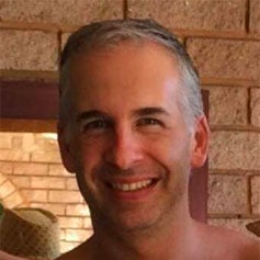 a man smiling for the camera