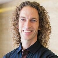 Jeffrey Allen with curly hair