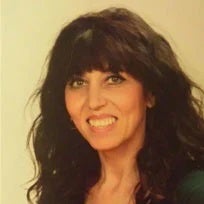 Nicole-Donald a woman with long hair