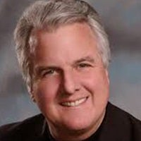 a man smiling for the camera