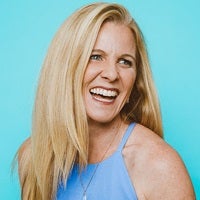 a woman smiling for the camera