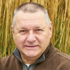 a man smiling for the camera