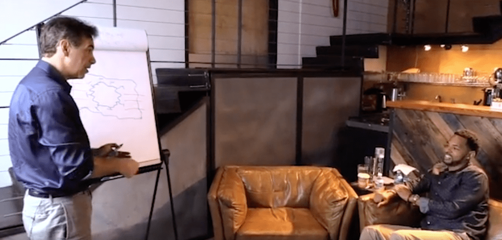 a man standing next to a woman