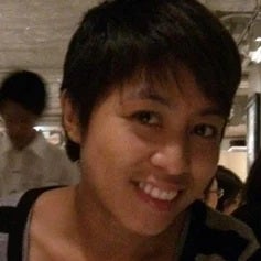 a woman smiling for the camera