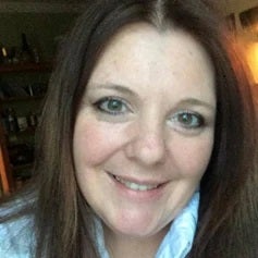 a woman smiling for the camera