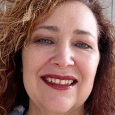 a close-up of a woman smiling