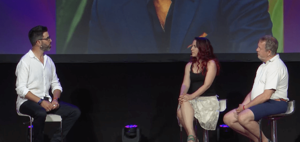 a group of people sitting on chairs