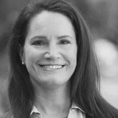 a woman smiling for the camera