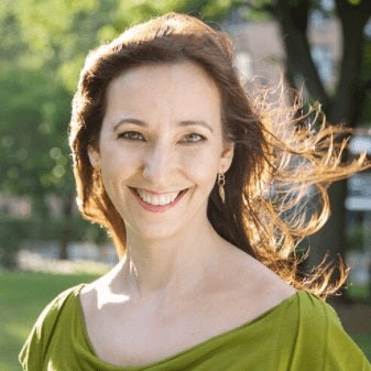Christina Berkley-min a woman smiling for the camera