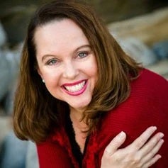 a person smiling and waving