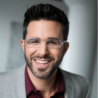 Rich Litvin-min a man wearing glasses