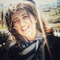 Tesi-Concetta-DEmma a woman with long hair smiling
