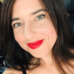 a woman with red lipstick