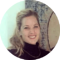 a person smiling at the camera
