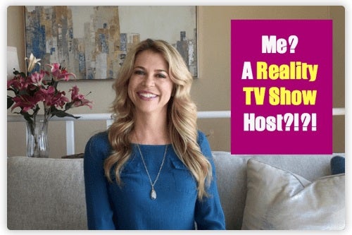 Christine Hassler sitting on a couch