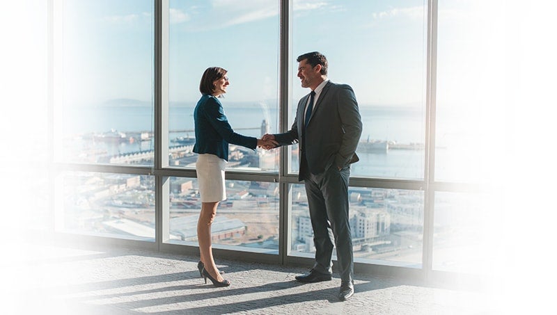 Packages-&-Pricing-responsive-thumbnail-min a man and a woman shaking hands