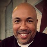 a man smiling for the camera