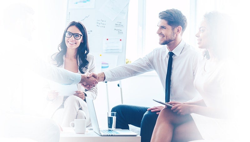 bonus-2-responsive-min a man and a woman shaking hands