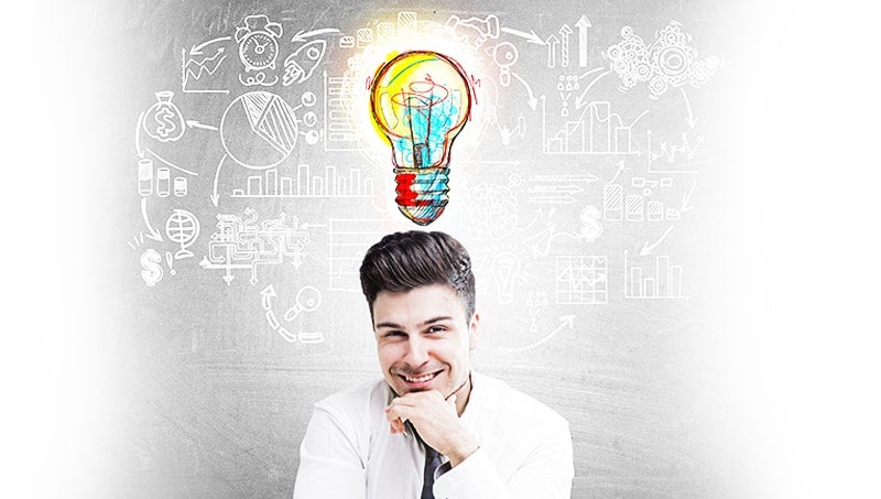 bonus-4-responsive-min a person in front of a chalkboard