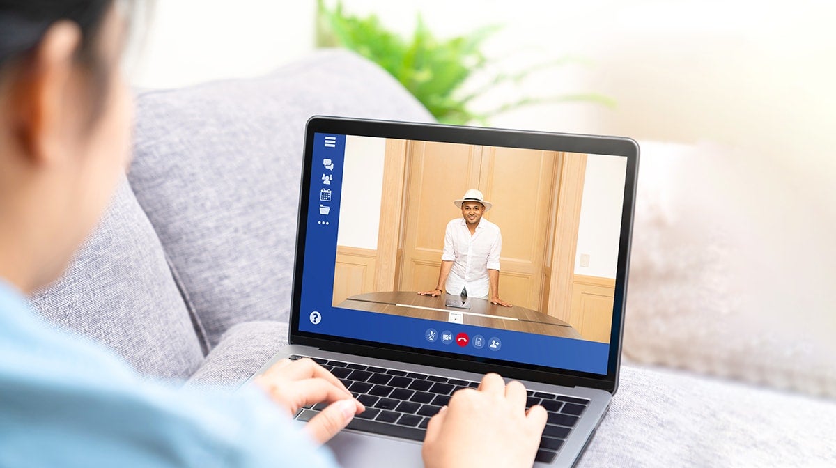 Weekly-Live-Classroom-Sessions-min a person using a laptop