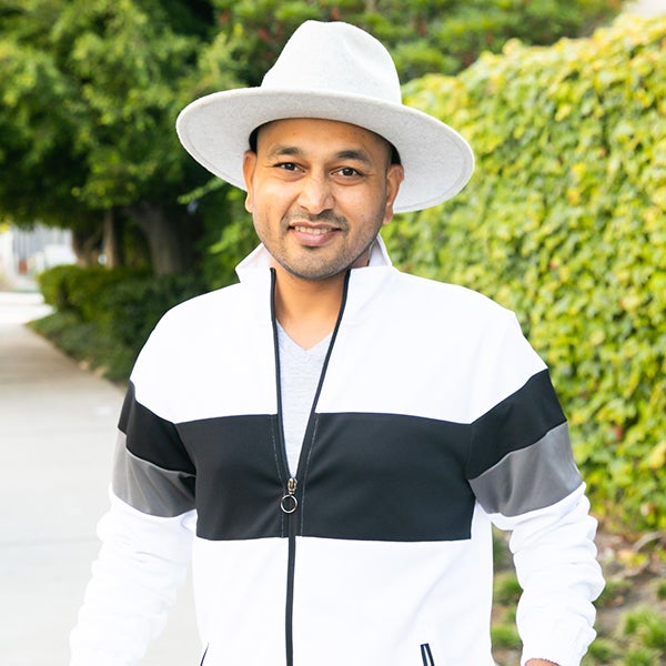 Ajit Nawalkha wearing a hat