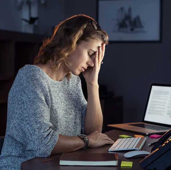 a woman sitting at a desk