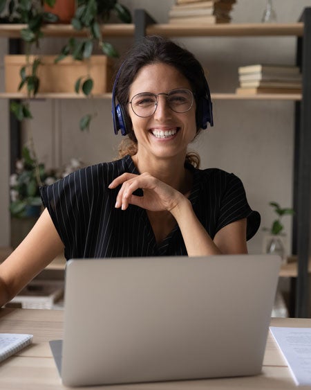 cfm-img-6 a person wearing headphones and smiling