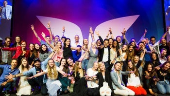 a group of people posing for a photo